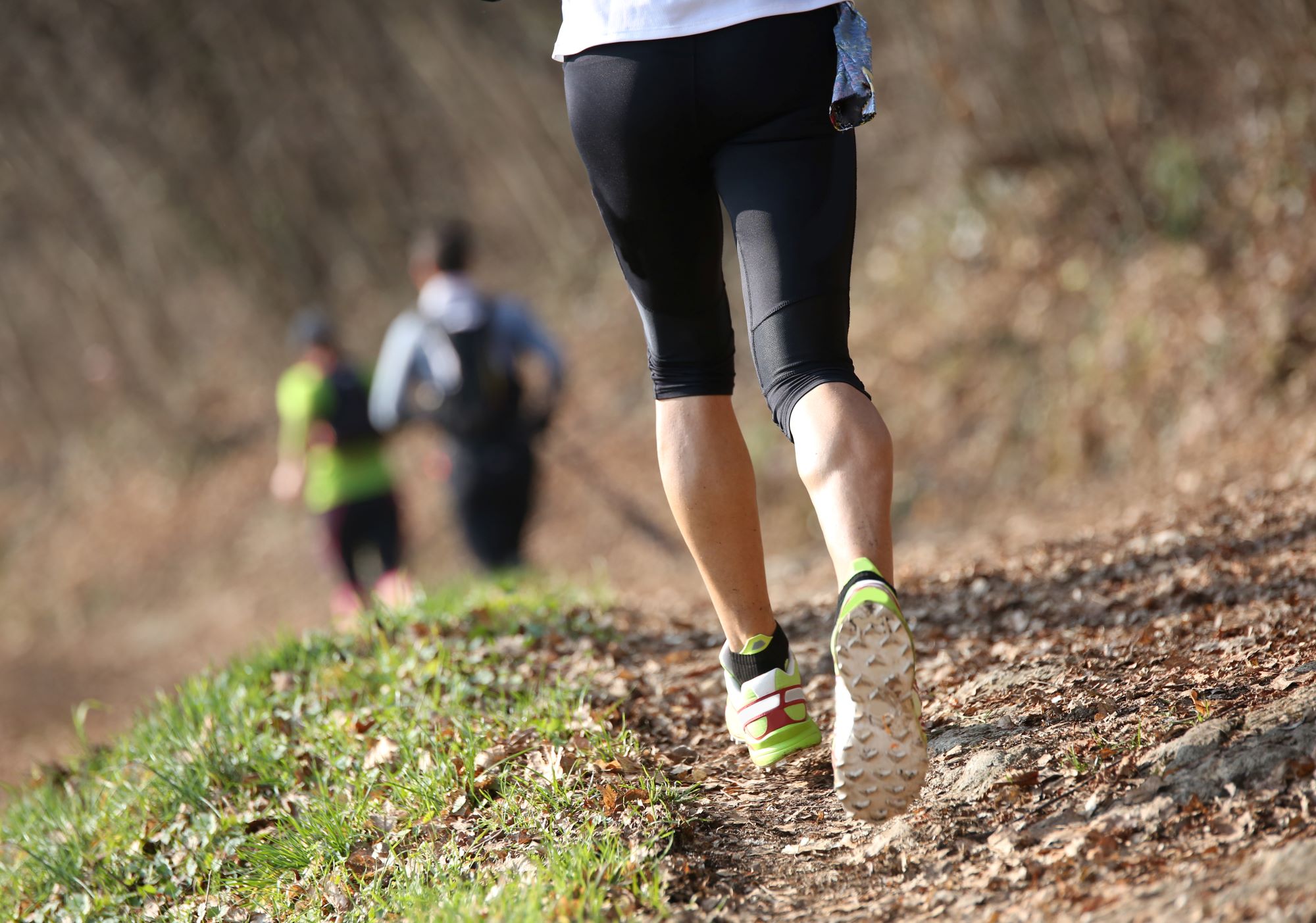 Muscular legs hiking.